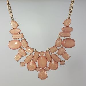New. Necklace salmon and gold color.